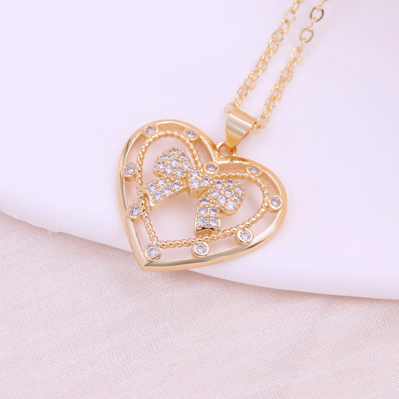 Gorgeous Gold Rhinestone Bow/Heart Necklace