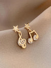 Gold Tone Mismatched Music Earrings